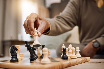 Man, playing hands and chess king in house, home living room or apartment in winner strategy, checkmate or board game success. Zoom, chessboard and winning pawn in thinking mind challenge or activity