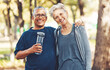 Portrait, exercise and senior couple with water bottle for training, workout and park. Mature man, old woman and hydration for practice, cardio and energy for wellness, health and fitness in nature