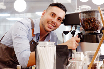 Wall Mural - coffee shop staff using coffee machine coffee shop concept.