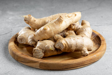 Organic fresh ginger root on the table.