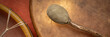 © MarekPhotoDesign.com - two handmade, native American style, shaman frame drums covered by goat skin with a beater, panoramic web banner