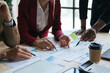 © PaeGAG - Meeting concept Business team hands at working with financial plan, meeting, discussion, brainstorm with tablet on the office desk,
