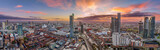 Fototapeta Nowy Jork - Manchester City centre Aerial night view of Deansgate Square and Beetham Tower Manchester northern  England. City Centre at sunrise with coloured sky