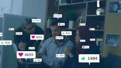 Poster - Animation of media icons over diverse business people using laptop