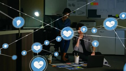 Poster - Animation of connected icons with lines over diverse coworkers sharing ideas and working over laptop