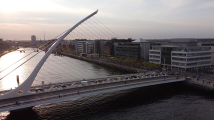 Wall Mural - Samuel Beckett Bridge over River Liffey in Dublin - aerial view by drone