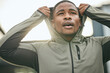 © S Fanti/peopleimages.com - Fitness, vision and hoodie with a sports black man getting ready for a workout, exercise or running. City, health and goal with a male athlete or runner outdoor in an urban town with motivation