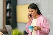 © ivanko80 - Smiling  female freelancer working at home