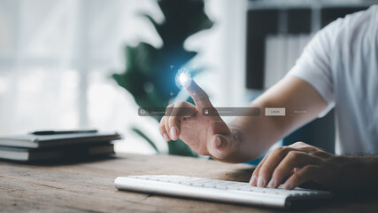 Businessman with a laptop, hologram icon fingerprint encryption, protecting access to confidential information by using fingerprint technology. Fingerprint encryption concept.