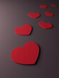 set of red 3d heart shapes on dark background