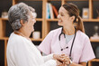 Leinwandbild Motiv Healthcare, insurance and a senior woman patient and nurse consulting during a checkup in a retirement home. Medical, support and wellness with a medicine professional talking to a mature female