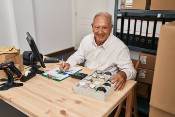 Poster - Senior man ecommerce business worker writing on clipboard at office