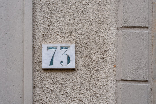 Number 73 on wall