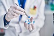© Krakenimages.com - Young hispanic man scientist holding pills at laboratory
