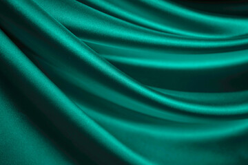 Wall Mural - Blue green silk satin. Emerald curtain. Drapery. Shiny fabric. Elegant background for design. Liquid, wave, ripple effect. Beautiful soft folds. Christmas, Valentine.