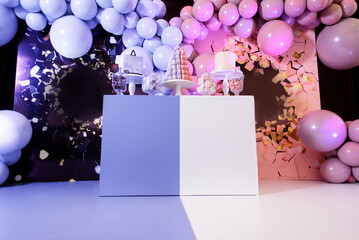 Wall Mural - Photo zone and candy bar for a gender party made in pink and blue colors.