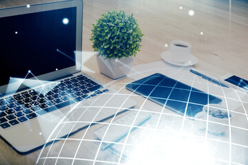 Poster - Double exposure of desktop with computer and world map hologram. International data network concept.