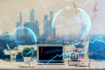 Poster - Stock market graph on background with desk and personal computer. Multi exposure. Concept of financial analysis.