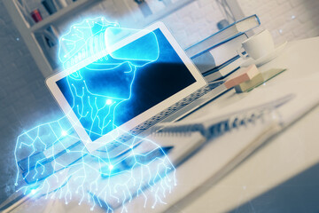 Poster - Computer on desktop with AR theme icon. Multi exposure. Concept of augmented reality.