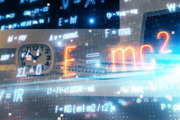 Desktop computer background and formula hologram writing. Double exposure. Education concept.