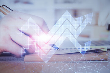 Poster - Businessman with creative business upward arrows on people hands background. Financial growth concept. Multi exposure.