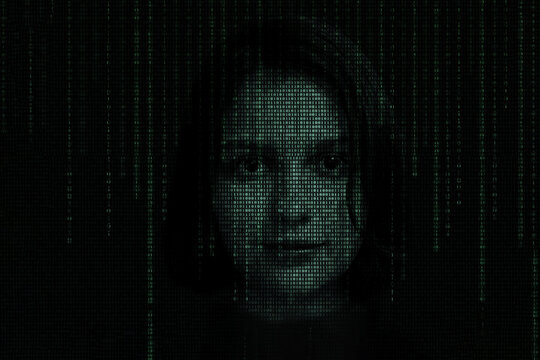 Female face with matrix digital numbers artifical intelligence AI theme with human face. The concept of artificial intelligence
