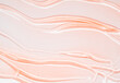 Gel serum pink texture cosmetics background, skincare hyaluronic acid or lubricant on white background.