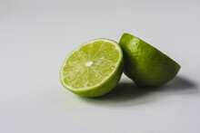 Close-up Of Lime Slices On White Background