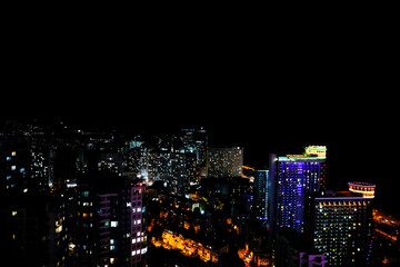 Wall Mural - Picturesque view of city with buildings at night