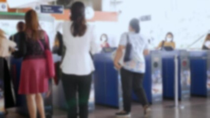 Wall Mural - defocused blurred crowd of people moving travel on the transition to the metro, defocused blurred ba