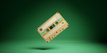 Retro Audio Cassette Tape 3d Rendering Illustration. Old Vintage Audio Casette On Green Background
