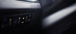 © alexkich - The process of choosing climate control in the car. Various controls in auto switches. Modern car interior