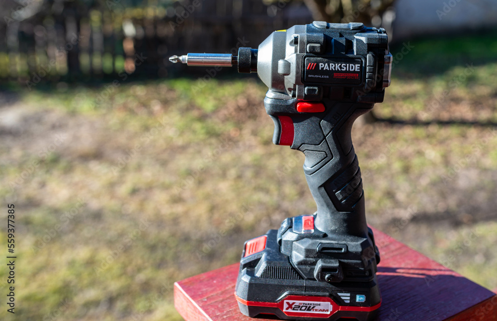 Miercurea Ciuc Romania 08 January 2023 Parkside brushless cordless impact driver on pine wood board Stock Photo Adobe Stock