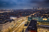 Fototapeta Miasto - Panoramic view over the skyline of the city center of Copenhagen, Denmark, during dusk time with moody sky