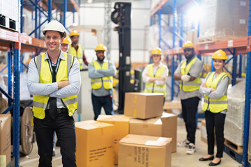 Wall Mural - Diversity group of worker in warehouse happy stand surround box portrait