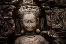 Stone Carved Diety At The Temple Of , Angkor Wat, Siem Reap, Cambodia.