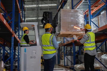 African american working in warehouse hold red light give signal to truck loading carton box