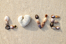 Word LOVE Made Of Shells On The Beach On A Tropical Island In Seychelles, Africa