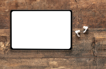 Poster - Mockup digital tablet. top view of blank white screen tablet, wireless earphone on old rustic wooden table. Top view blank screen tablet