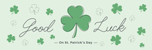 Three Leaf Clover And Many Small Clovers Good Luck On Saint Patrick's Day Banner With Handwritten Typography Lettering Line Design