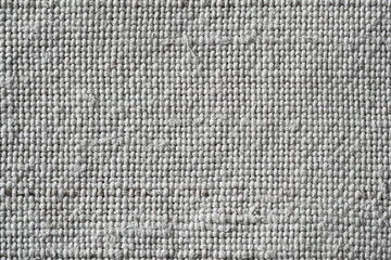 Wall Mural - Fabric texture. Canvas background. The texture of a rough gray cloth. Macro image from canvas