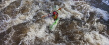 Water Sports Competitions On Kayaks On A Full-flowing River In Spring