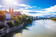 Rhine river and Munster cathedral in Basel sun haze view from the bridge