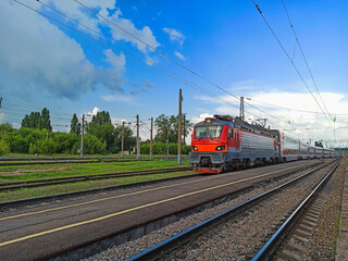 Wall Mural - Red train in modern railway