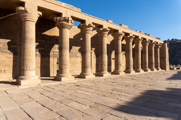 Columns of the Philae temple full of hieroglyphs.