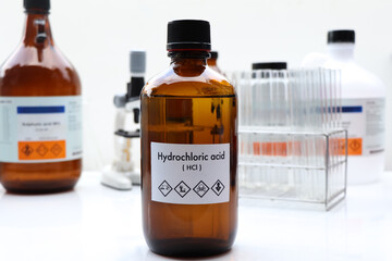 Wall Mural - hydrochloric acid in bottle , chemical in the laboratory and industry