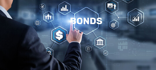 Wall Mural - Businessman clicks a bonds virtual screen. Bond Finance Banking Technology concept. Trade Market Network