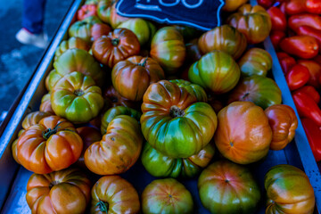 Wall Mural - ripe red spanish healthy tomatoes on a market stand