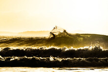 Surfer At Sunrise