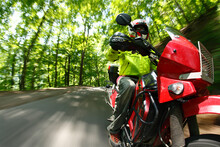 Motion-blur Bike-mounted Camera Angle Of A Motorcycle Riding On A Forested Road In The New River Gorge Near Fayetteville, WV